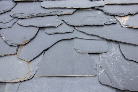 Texture of a slate roof. Roof of a house