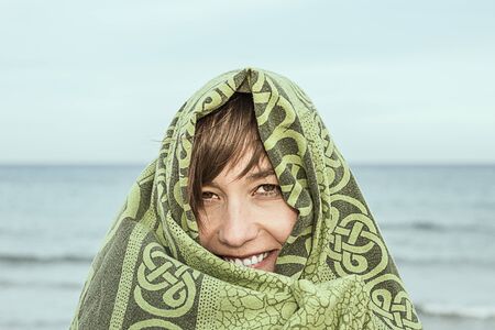 Girl with a veil on her head and an intense and mysterious look