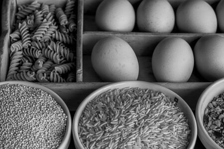 Whole-grain pasta and whole grains . Healthy food set with eggs and whole grains , rice, quinoa, oats, seeds, kamut and spaghettiの写真素材