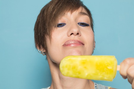 Girl eating ice cream. Funny picture eating ice cream