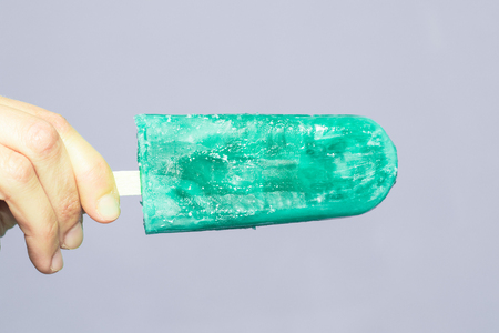 Ice cream popsicle , with blue backgroundの写真素材