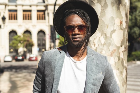 African american guy portrait handsome with style. Black young man in the cityの写真素材