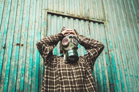 Person wearing a gas mask. Contamination and Pollution Conceptの写真素材