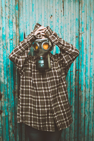 Person wearing a gas mask. Contamination and Pollution Conceptの写真素材