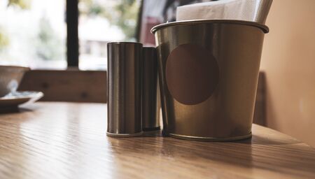 Template or blank for a business company logo on a glass in a cafe. Paper circle for symbol and slogan.の写真素材