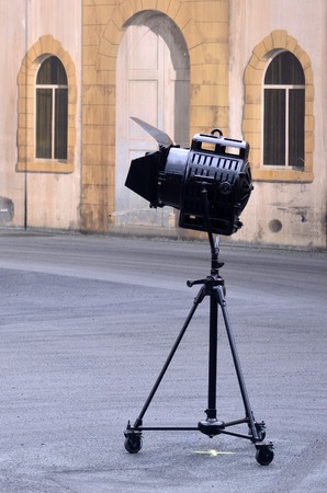 Vintage theater spotlight on a movie set stage.の写真素材