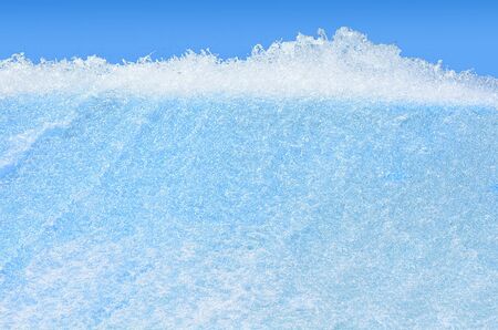 Big water wave flow against blue sky. Abstract background texture.の写真素材