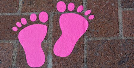 Pink footprint on the floor.の写真素材