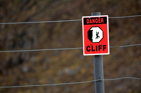 Danger Cliff sign and symbol. concept photo of danger and risk taking. copyspaceの写真素材