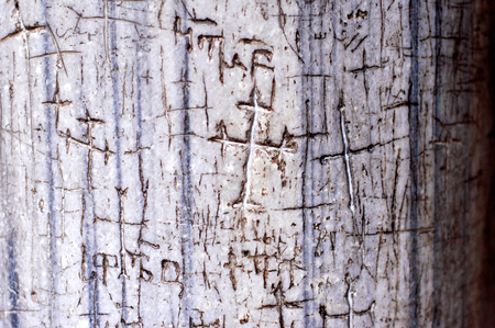 Crosses are carved into a marble wall in the holy sepulchre church, Jerusalem, Israelの写真素材