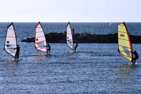 Wind surfing on Tel-Aviv beach on the coastline of the Mediterranean sea. Israel.のeditorial素材