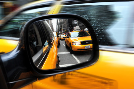 Yellow taxi cab, one of the public transportation in Manhattan New York, USA.