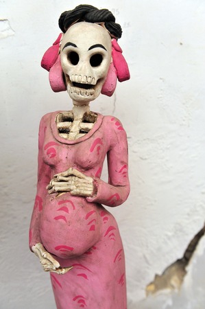 Mexican folklore skeleton of pregnent woman for sale at  the Art-market of San Angel in Mexico City, Mexico.の写真素材