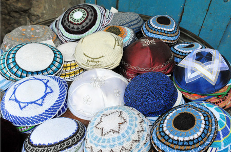 Jewish Yarmulkes for sale in shops in the Jerusalem Old City market, Israel.の写真素材