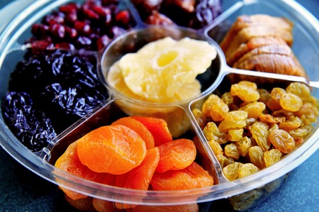 Plate with a selection of dried fruits.の写真素材