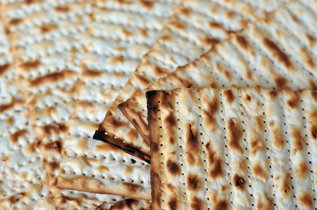 Traditional Jewish Matzo sheet on a Passover Seder table. Passover  is a predominantly Jewish holy...