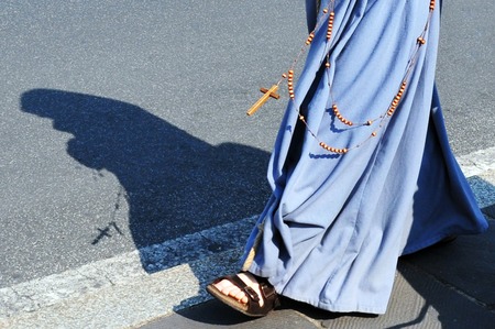 Catholic nun  walks at Vatican city in Rome Italy.の写真素材