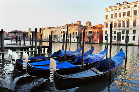 Gondolas mooring in the Grand Canal in Venice, Italy.のeditorial素材