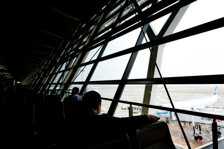 SHANGHAI, CN - MAR 15 2015:Shanghai Pudong International Airport.Shanghai Pudong is the busiest international hub in mainland China, ranking 22nd globally in terms of international trafficのeditorial素材