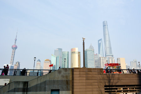 SHANGHAI, CN - MAR 15 2015:Pudong New Area skyline in Shanghai, China.Pudong is home to the Lujiazui Finance and Trade Zone and the Shanghai Stock Exchange and many of Shanghai's best-known buildings.のeditorial素材