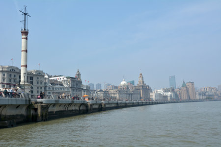 SHANGHAI, CN - MAR 17 2015:Shanghai - The Bund or Waitan skyline. Shanghai Bund has dozens of...