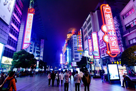 SHANGHAI, CN - MAR 17 2015:Visitors at Nanjing Road. It is the main shopping street of Shanghai, China, and is one of the world's busiest shopping streets.のeditorial素材