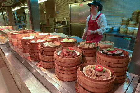 SHANGHAI - MAR 15 2015:Chinese food on display in a food market in Shanghai China.Chinese cuisine go back for thousands of years, changed according to climate, imperial fashions and local preferences.のeditorial素材