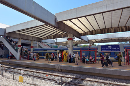 TEL AVIV, ISR - APR 05 2015:Passengers in Tel Aviv Savidor Central Railway Station.It's  the main central train station of Tel Aviv and one of the main railway hubs of Israel.のeditorial素材