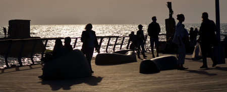 TEL AVIV, ISR - MAR 27 2015:Visitors in Namal Tel Aviv port. It is a popular travel destination of commercial and entertainment district in northwest Tel Aviv, Israel along the Mediterranean Sea.のeditorial素材