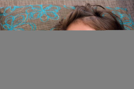 Healthcare and medicine concept  ill girl child with thermometer in mouth.の写真素材