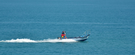 TEL AVIV - APR 19 2015:Israeli fishermen on fishing boat.The total consumption of fish in State of Israel in 2004 was 65,000 tons of sea fish 65% imported, with most local produce indoor fish pondsのeditorial素材