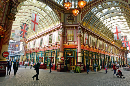 LONDON - MAY 13 2015:Pedestrians in Leadenhall Market in London, UK.It's one of the oldest markets in London, dating back to the 14th century, located in the historic centre of the City of London.のeditorial素材