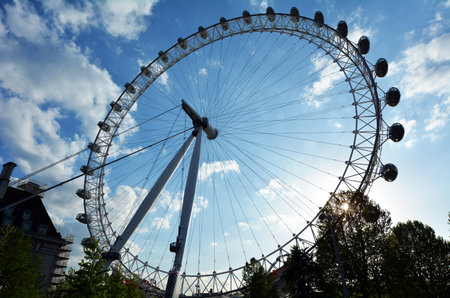 LONDON, UK - MAY 15 2015:Silhouette of London Eye in London, UK.The London Eye can carry 800 people each rotation, which is comparable to 11 London red double decker buses.のeditorial素材