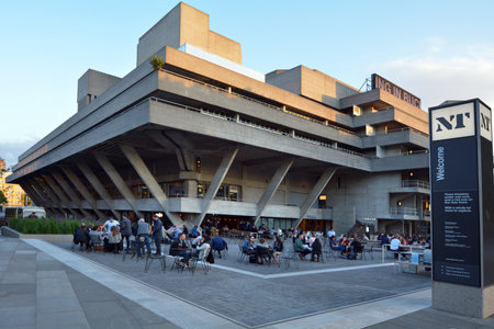 LONDON, UK - MAY 15 2015:Visitors outside the Royal National Theatre in London UK.The National has been awarded over 450 major drama awards since its move to the South Bank in 1976.のeditorial素材