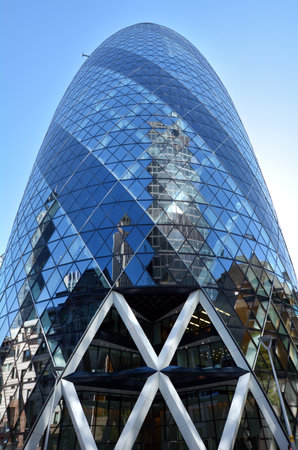 LONDON - MAY 13 2015: 30 St Mary Axe tower building. The building has become an iconic symbol of London and is one of the city's most widely recognised examples of contemporary architecture.のeditorial素材
