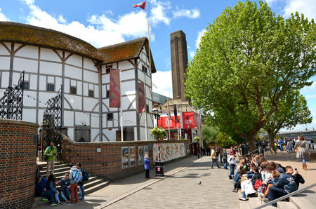 LONDON, UK - MAY 13 2015:Visitors at Globe Theatre in London England UK.The building have special permission for it's thatched roof as there is a law against it in London since the Great Fire in 1666.のeditorial素材