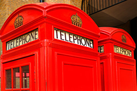 LONDON - MAY 13 2015:Two K2 kiosk Red telephone boxes in London, UK.Due to cost, around £35 14s 0d per kiosk, only 1,700 examples were installed by 1934, mostly in London.のeditorial素材