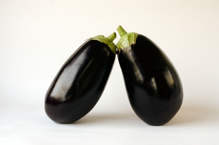 Two Aubergine on a white background.の写真素材