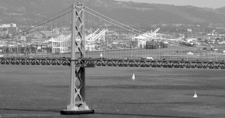 SAN FRANCISCO - MAY 21 2015:Oakland Bay Bridge San with Francisco harbour, California.It carries about 240,000 vehicles a day on its two decks.It has one of the longest spans in the United States.のeditorial素材