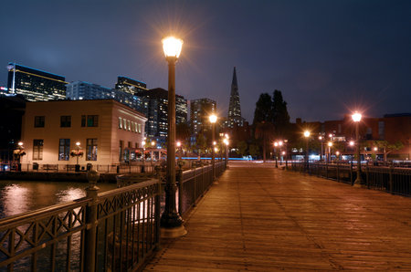 SAN FRANCISCO - MAY 15 2015: Transamerica Pyramid at night in San Francisco, CA.  At 853 feet (250 meter) tall the Transamerica Pyramid is the tallest skyscraper in the San Francisco skyline.のeditorial素材