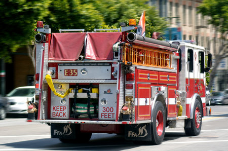 SAN FRANCISCO - MAY 21 2015:SFFD Truck E35 operating at a fire in the Tenderloin.San Francisco Fire Department serves an estimated population of 1.4 million people in the 47.5 square miles (123 km2)のeditorial素材