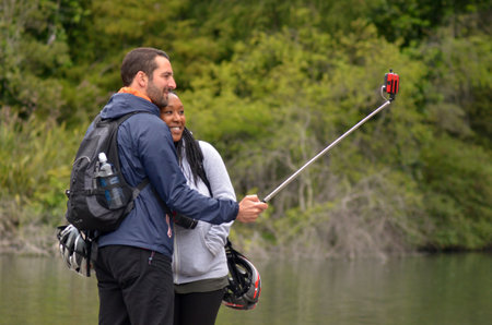 SAN FRANCISCO - MAY 15 2015:Mixed race couple take selfie.In past of the Western world certain jurisdictions banned interracial marriage: Nazi Germany, Apartheid South Africa and US states till 1967のeditorial素材