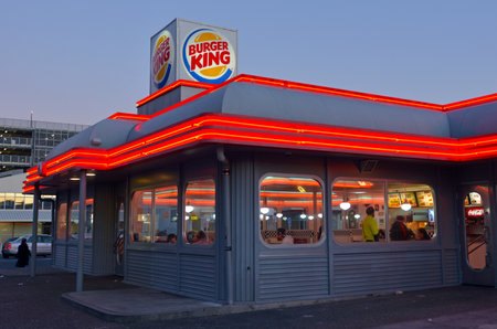 HAMILTON, NZL - JUNE 16 2015:Burger King restaurant at dusk. At the end of its 2013 fiscal year, Burger King is the second largest chain of hamburger fast food restaurants in terms of global locationsのeditorial素材