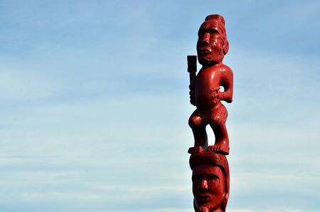 An ancient Maori sculpture of man and a woman mad out of wood.の写真素材