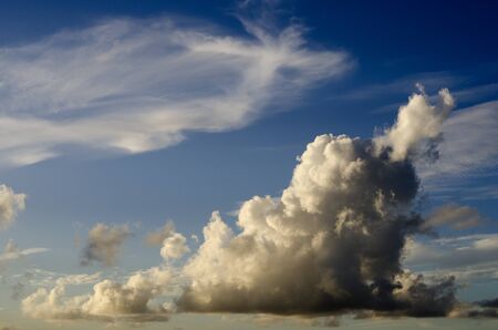 Great white cloud in the sky during summer sunset.の写真素材