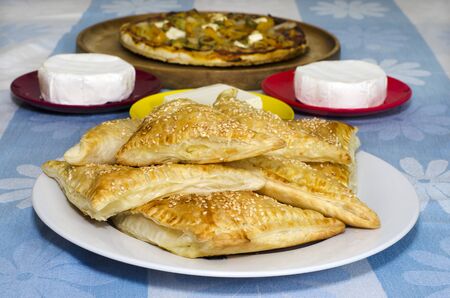 A plate of cheese Bourekas on a table during Shavuot Jewish Holiday.の写真素材