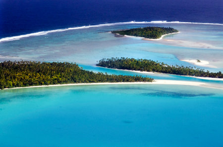 AITUTAKI - SEP 16:Aerial view of One foot island, Tekopua island and Motukitiu Island on Sep 16 2013.Polynesians first settled Aitutaki around AD 900.のeditorial素材