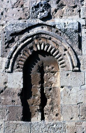 An ancient arrowslit on Jerusalem great wall.の写真素材