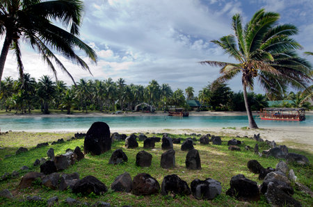 AITUTAKI - SEP 20: Te-Poaki-O-Rae the stone of Rae on Sep 20 2013.It's over 1000 years old built from volcanic rocks arranged in rows facing the main pillar placed on the sunrise side towards east.のeditorial素材
