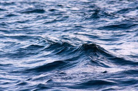 Small ocean waves liquid at sea.の写真素材
